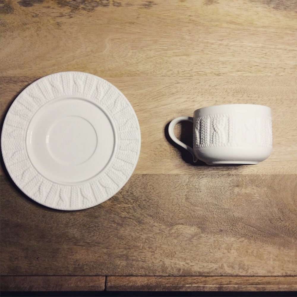 Sweater coffee tea cup with saucer